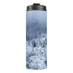 Calm foggy winter day on top of the mountains thermal tumbler