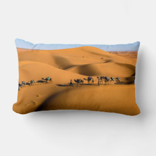 camels on desert under blue sky lumbar cushion