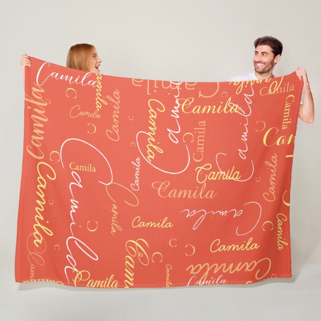 Camila custom name initial repeated on orange red fleece blanket (In Situ)