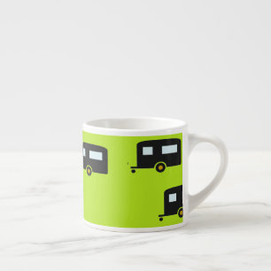 Camp trailers on green espresso cup