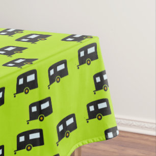 Camp trailers on green tablecloth