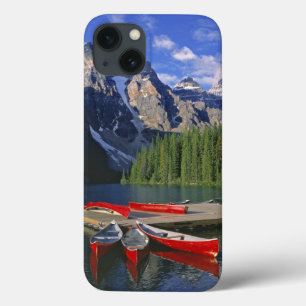 Canada, Alberta, Moraine Lake. Red canoes await iPhone 13 Case