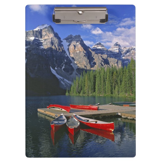 Canada, Alberta, Moraine Lake. Red canoes await Clipboard (Front)