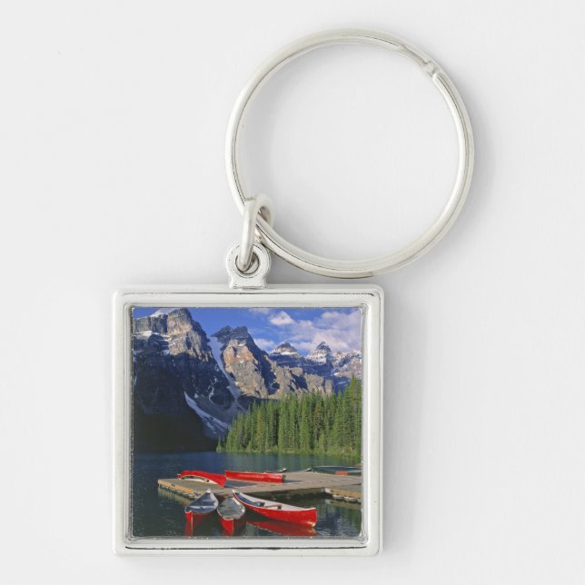 Canada, Alberta, Moraine Lake. Red canoes await Key Ring (Front)