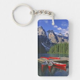 Canada, Alberta, Moraine Lake. Red canoes await Key Ring