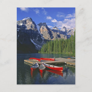 Canada, Alberta, Moraine Lake. Red canoes await Postcard