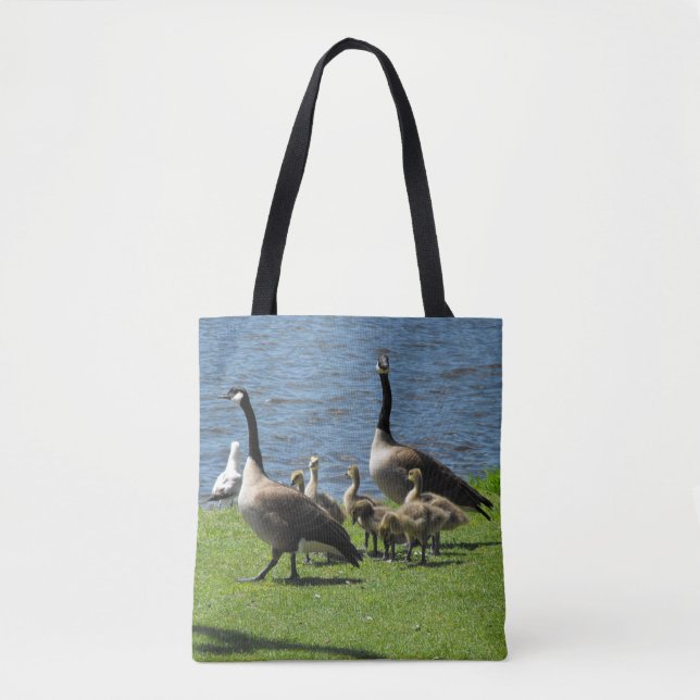 Canada Geese on the Grass by the Water Tote Bag (Front)