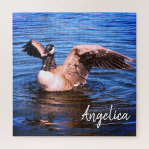 Canada Goose Flapping Her Wings Blue Water Nature Jigsaw Puzzle