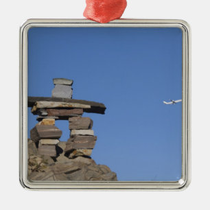 Canada, Newfoundland, St. John's. Inukshuk (to Metal Tree Decoration