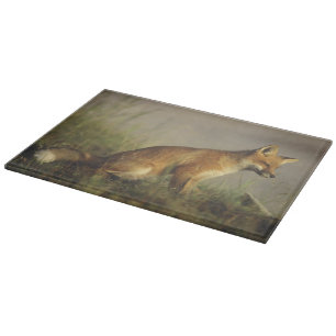 Canada, Quebec. Red fox cub at sunrise Cutting Board