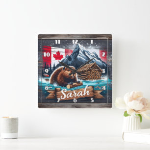 Canadian Beaver in Water With Logs Near Mountains Square Wall Clock