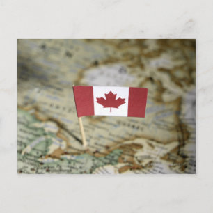 Canadian flag in map postcard