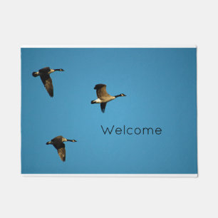 Canadian geese in flight doormat
