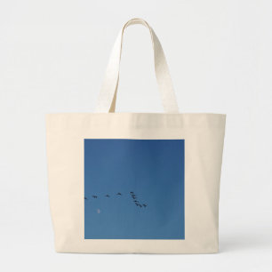 Canadian geese in flight large tote bag