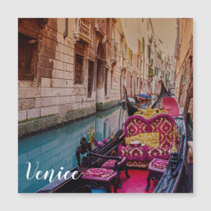 Canal with traditional gondola in Venice, Italy