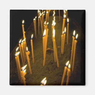 Candles lit in a church, Armenia Magnet