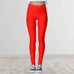 Candy Apple Red Solid Color Leggings<br><div class="desc">Candy Apple Red Solid Color. A bold and eye-catching,  vibrant shade of red that exudes energy and passion. This intense color is sure to make a statement and capture attention. Perfect for holiday themes,  Candy Apple Red brings a festive and joyful spirit to your celebrations.</div>