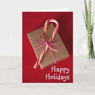 Candy can on top of Christmas gift Holiday Card