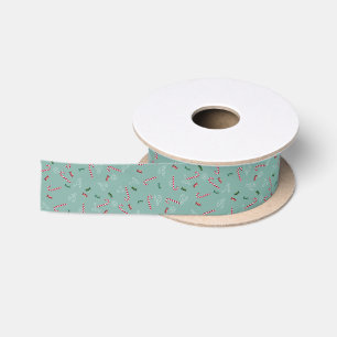 Candy canes and sweets on turquoise satin ribbon