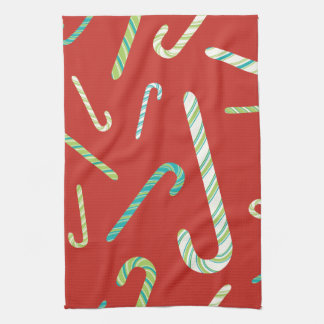 Candy Canes on a Red background Tea Towel