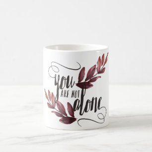 Caneca with the phrase "You are not alone" Coffee Mug