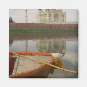 Canoe in water with Taj Mahal, Agra, India Magnet