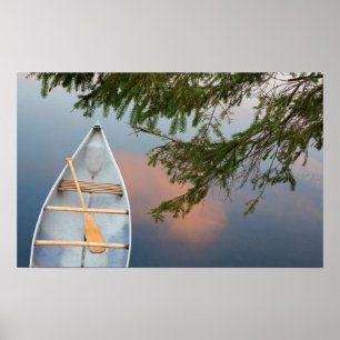 Canoe on lake at sunset, Canada Poster