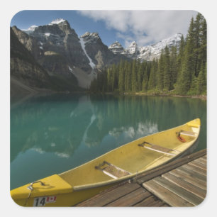Canoe parked at a dock along Moraine Lake, Banff Square Sticker