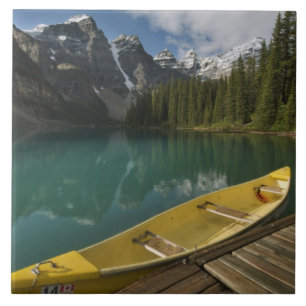 Canoe parked at a dock along Moraine Lake, Banff Tile