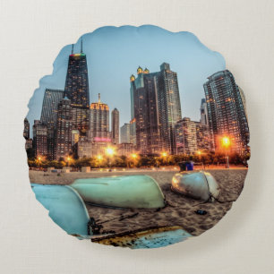 Canoes on Oak Street Beach a little after sunset Round Cushion