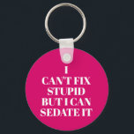 Can't Fix Stupid Key Ring<br><div class="desc">Round button keychain features text "I Can't Fix Stupid,  But I Can Sedate It" on a hot pink background or any colour you choose,  perfect for a paramedic,  nurse,  or doctor. Keychains make fun gifts for family and friends or create for yourself.</div>
