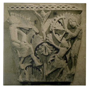 Capital depicting a man shooting an arrow into the tile