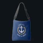 Captain Your Boat Name Anchor Gold Laurel Navy Crossbody Bag<br><div class="desc">A stylish cross-body tote bag with Captain or other title, your personalised name, boat name or other desired text. Features a custom designed nautical boat anchor with gold style laurel leaves and star on navy blue. Easily customise the base colour to match your current decor or theme. Reusable and great...</div>