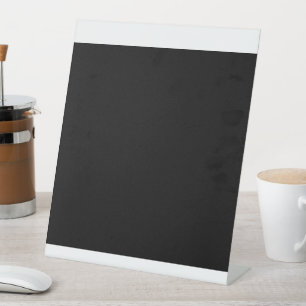 Captivating Black and White Photo of a Vintage Pedestal Sign