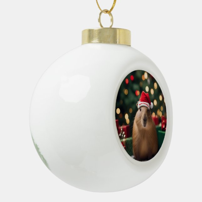 "Capybara Claus: A Festive Bokeh Wonderland" Ceramic Ball Christmas Ornament (Left)