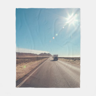 Car on black asphalt road fleece blanket