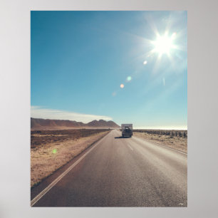 Car on black asphalt road poster