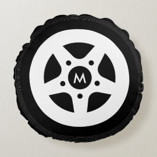 Car wheel throw pillow with black tires and rims