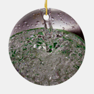 Carbonated Liquid Poured into a Cup Ceramic Ornament