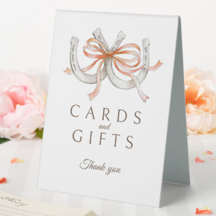 Cards gifts orange ribbon horseshoes wedding sign