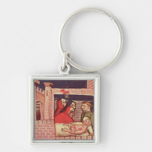 Caring for an injured man in a castle key ring