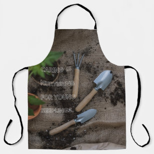 “CARING IS NURTURING FOR YOUNG SEEDLINGS” designer Apron