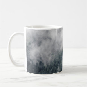 Carpathian mountains in the clouds, fog in the mou coffee mug
