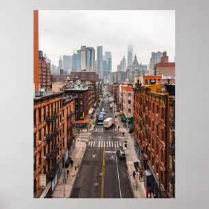 CARS ON ROAD BETWEEN HIGH RISE BUILDINGS DURING DA POSTER