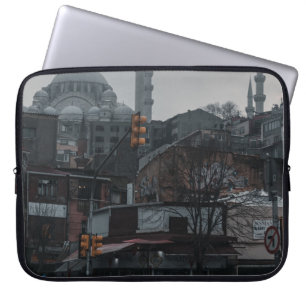 CARS PARKED NEAR BUILDING LAPTOP SLEEVE