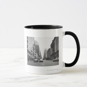 Cars riding on city street B&W Mug