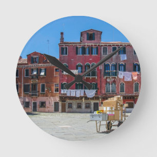 Cart with boxes in Venice Round Clock