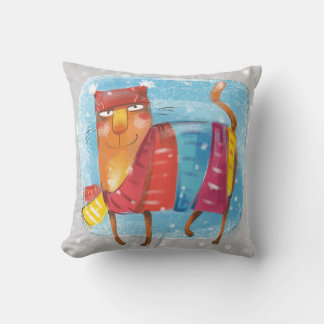 Cartoon cat, wrapped up warm in winter snow scene cushion