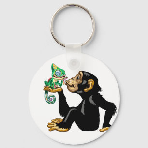 Cartoon chimpanzee holding a chameleon key ring