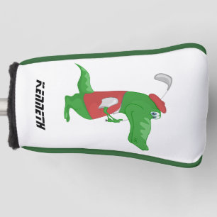 Cartoon crocodile playing golf with a red hat. head cover